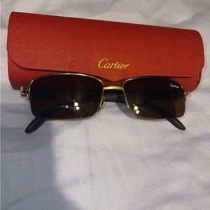 Gold rim Cartier glasses